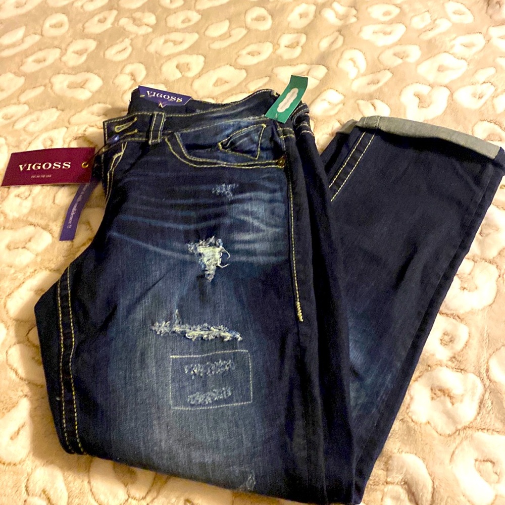 Brand new beautiful jeans. Can be worn as capris or jeans.